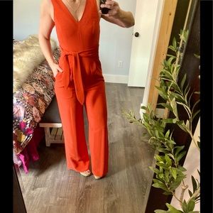 Antonio Melani bright melon orange red fitted jumpsuit with pockets
